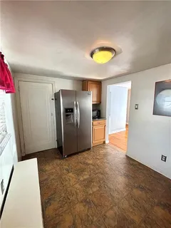 a view of a kitchen with a sink