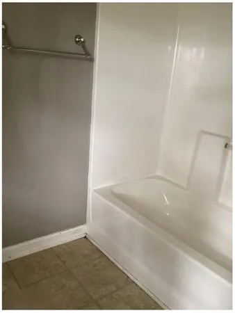 a bathroom with a bathtub