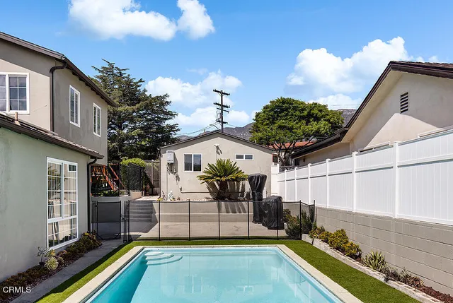 a house view with a garden space