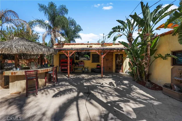 a view of a chairs and tables in patio