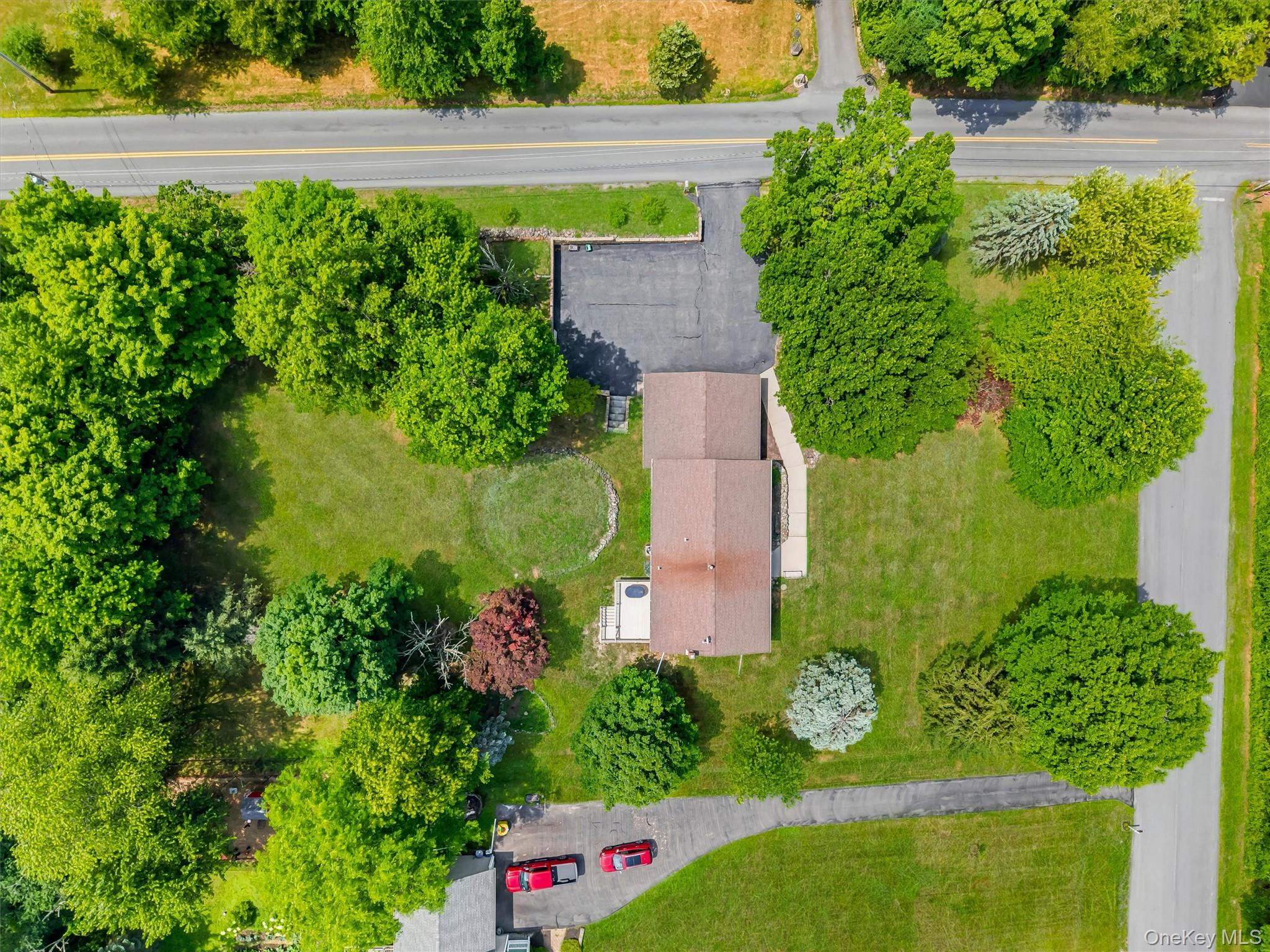 318 Beattie Road Washingtonville, NY 10992 - Photo 40 of 42 an aerial view of a house with a yard