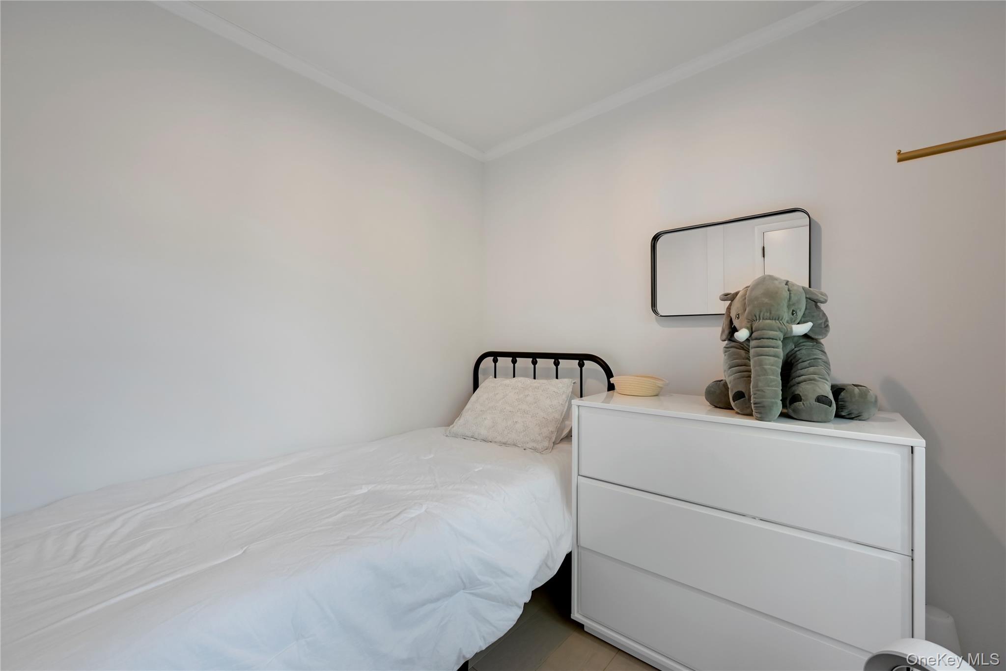 47 Mountainview Drive Tomkins Cove, NY 10986 - Photo 19 of 39 a bedroom with a bed and cabinet