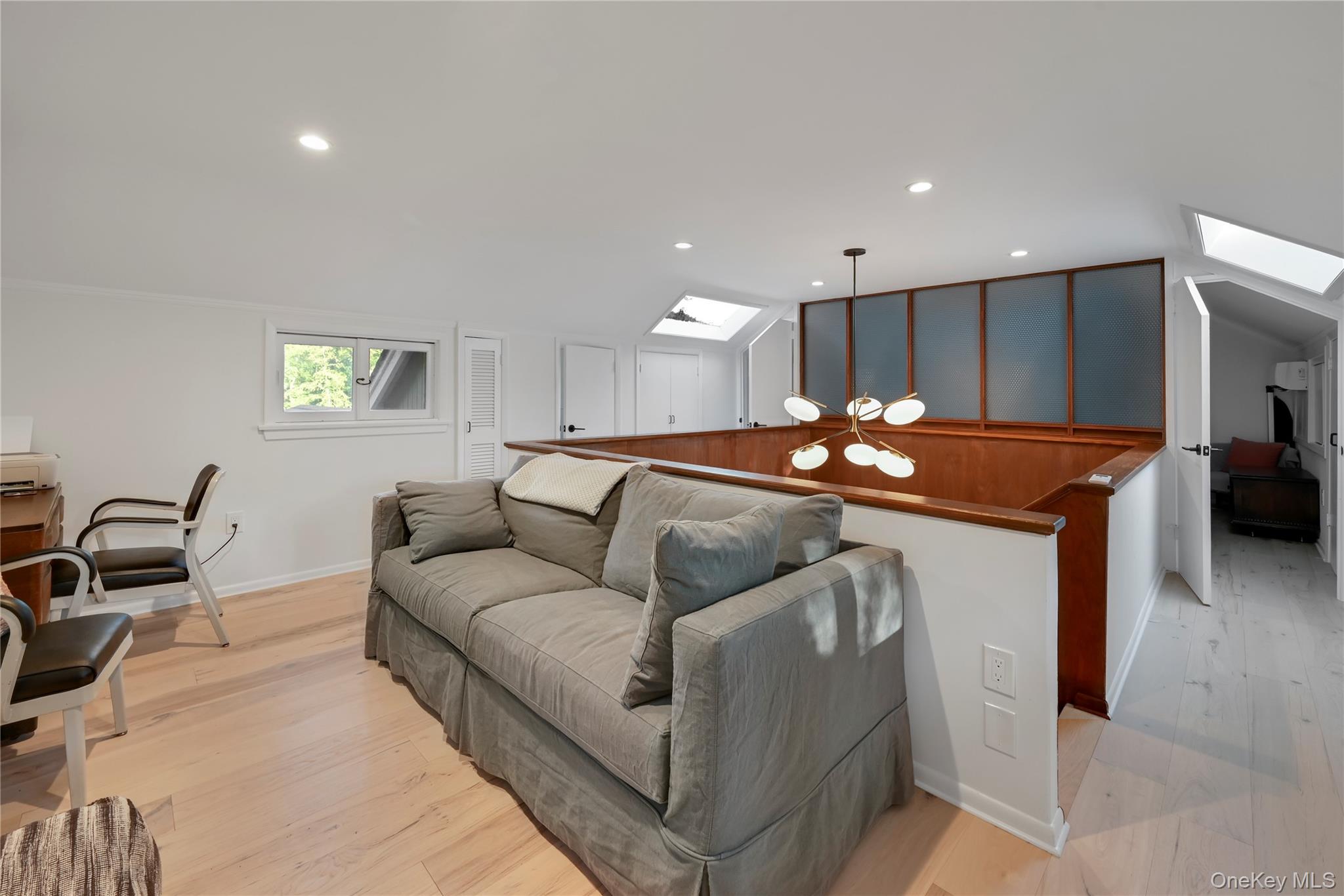 47 Mountainview Drive Tomkins Cove, NY 10986 - Photo 22 of 39 a living room with furniture and a table