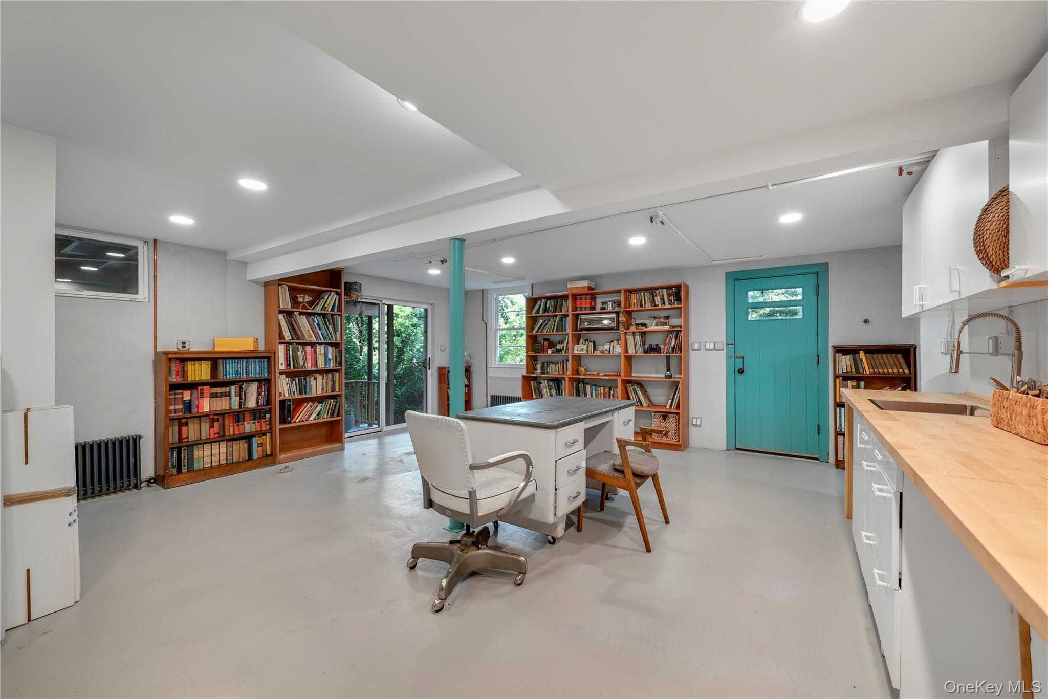 47 Mountainview Drive Tomkins Cove, NY 10986 - Photo 28 of 39 a view of a livingroom with furniture and a bookshelf