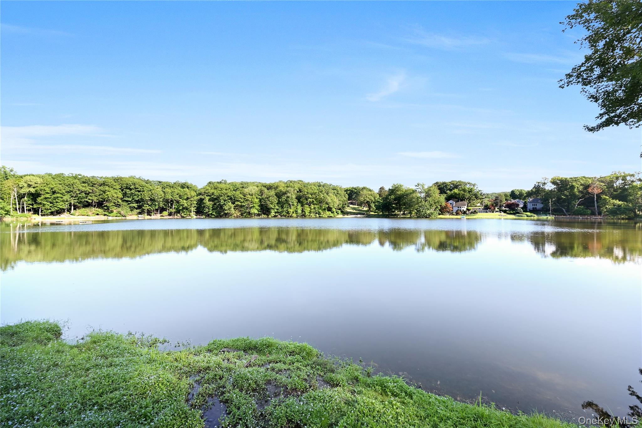 47 Mountainview Drive Tomkins Cove, NY 10986 - Photo 36 of 39 a view of a lake with houses in the back