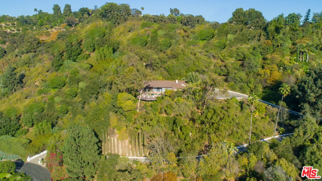 10895 Chalon Road Los Angeles, CA 90077 - Photo 2 of 19 a view of a big yard