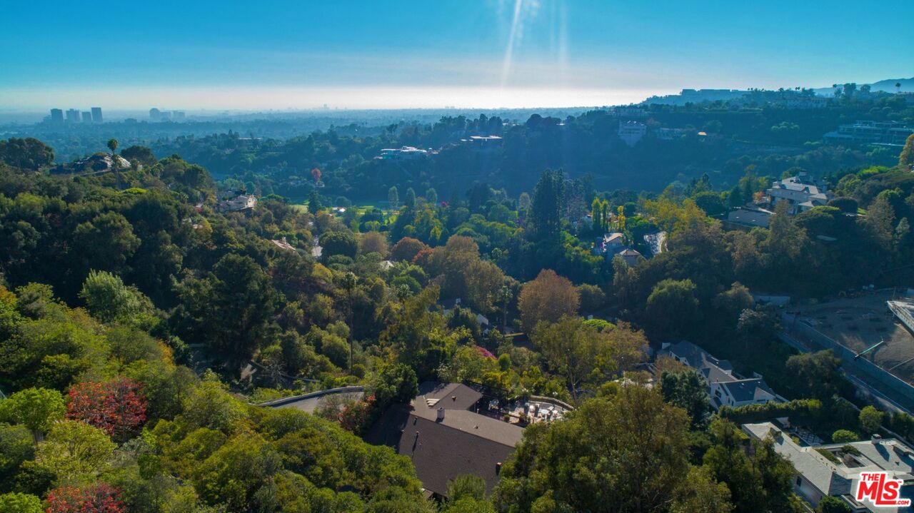 10895 Chalon Road Los Angeles, CA 90077 - Photo 19 of 19 an aerial view of a house with lots of plants