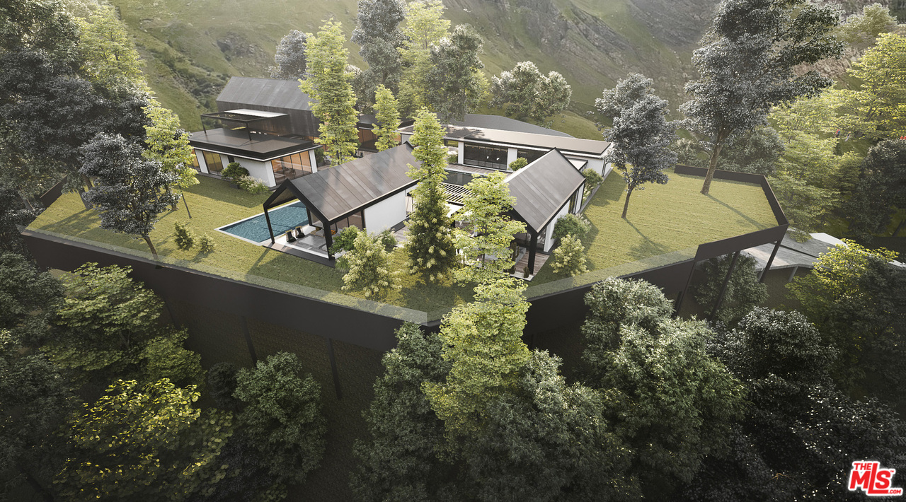 10895 Chalon Road Los Angeles, CA 90077 - Photo 3 of 19 an aerial view of a house with swimming pool and garden space