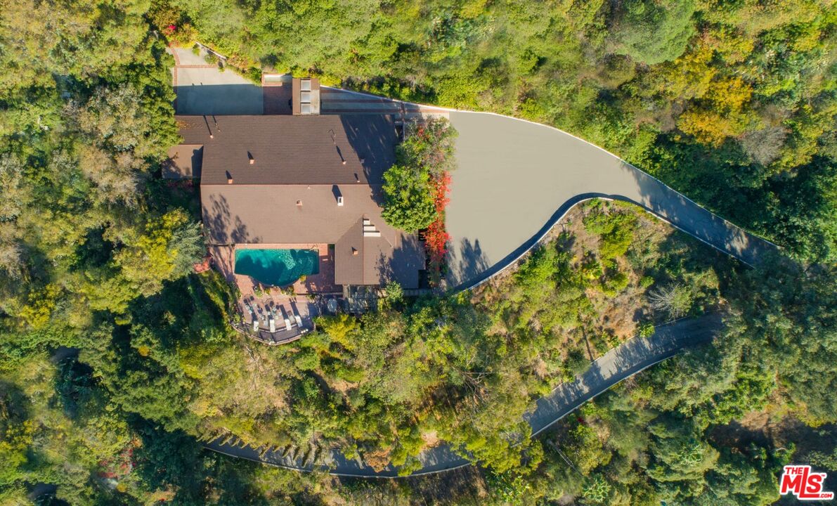 10895 Chalon Road Los Angeles, CA 90077 - Photo 6 of 19 an aerial view of a house with a yard and garden