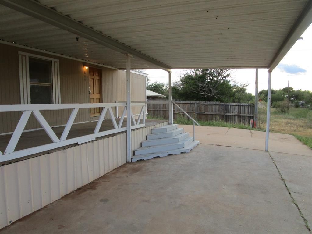 800 Bluff Street Sweetwater, TX 79556 - Photo 2 of 19 a view of a house with a wooden deck