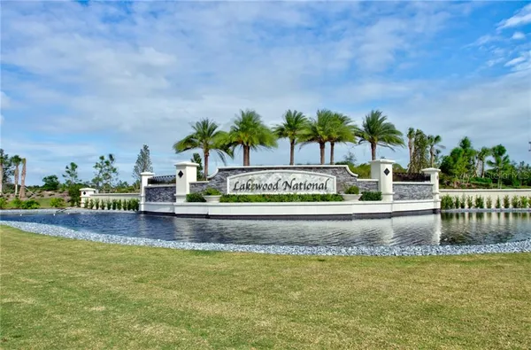 a view of swimming pool with outdoor seating and hardwood floor