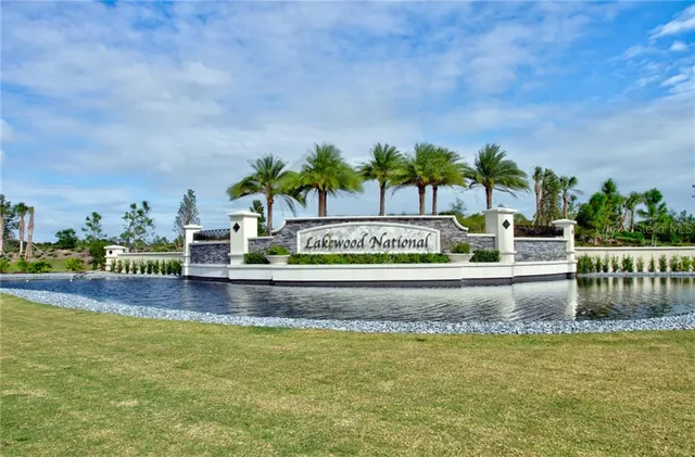 a view of swimming pool with outdoor seating and hardwood floor