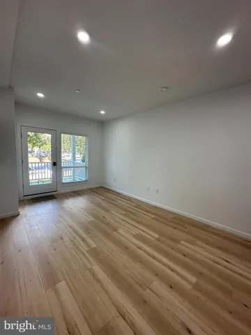 a view of a porch with a floor to ceiling window