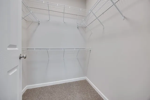 a view of a livingroom with wooden floor