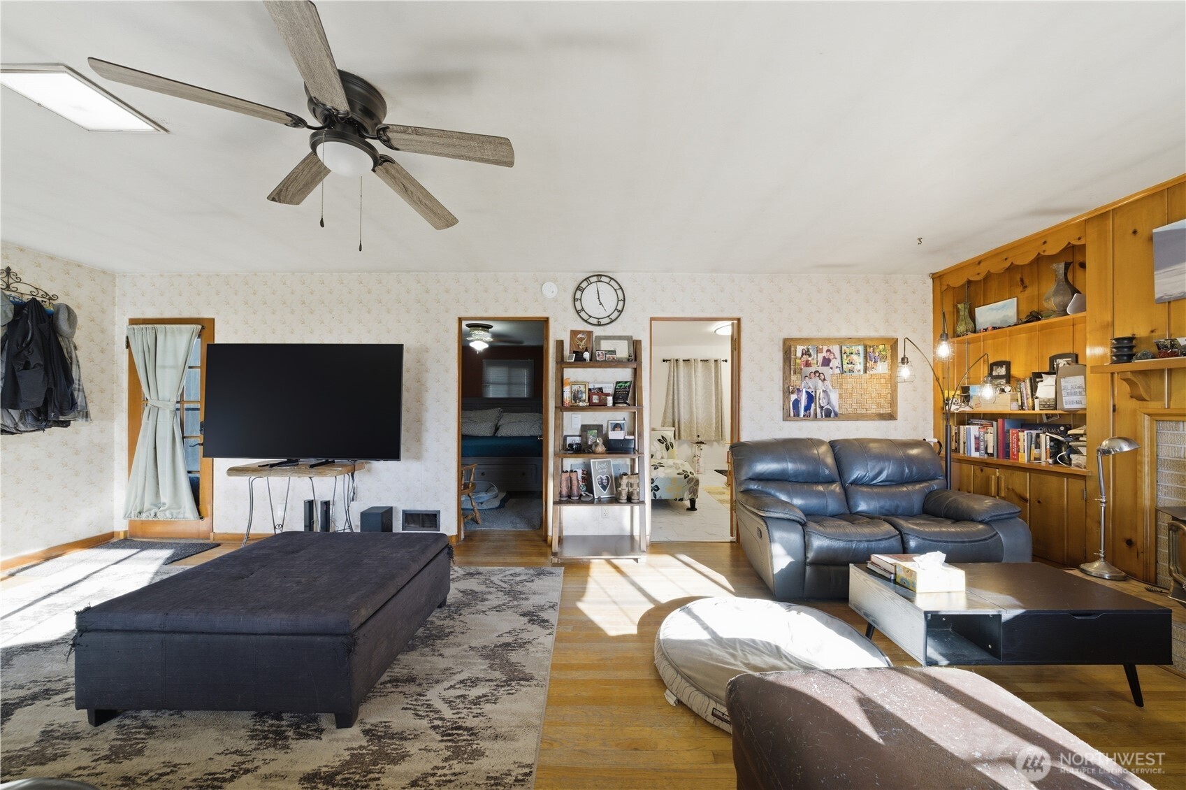 231 Main Street Waitsburg, WA 99361 - Photo 4 of 35 a living room with furniture and a flat screen tv