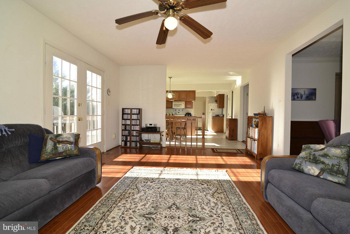12711 Roark Court Reston, VA 20191 - Photo 11 of 30 Family Room w/ Sliding Glass Door to Deck