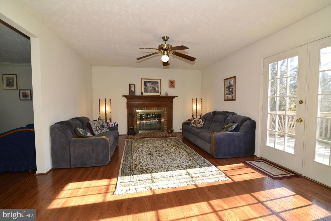 12711 Roark Court Reston, VA 20191 - Photo 10 of 30 Family Room w/ Gas Fireplace