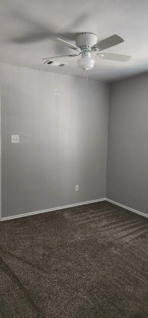 6900 Old Quarry Lane Austin, TX 78731 - Photo 6 of 9 Empty room with visible vents, baseboards, and ceiling fan