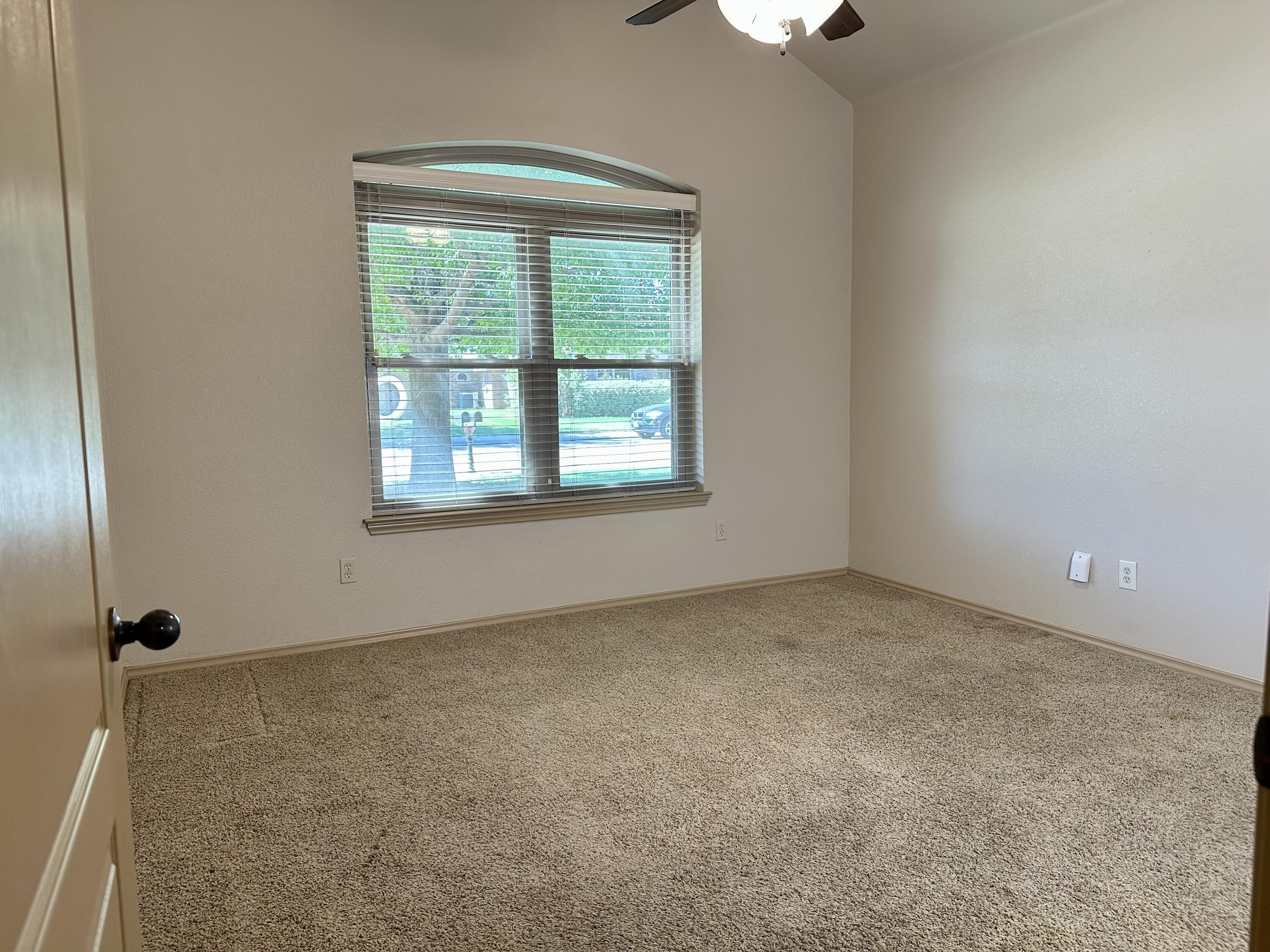 6114 75th Place Lubbock, TX 79424 - Photo 29 of 35 an empty room with a window