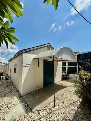 a view of a house with a patio