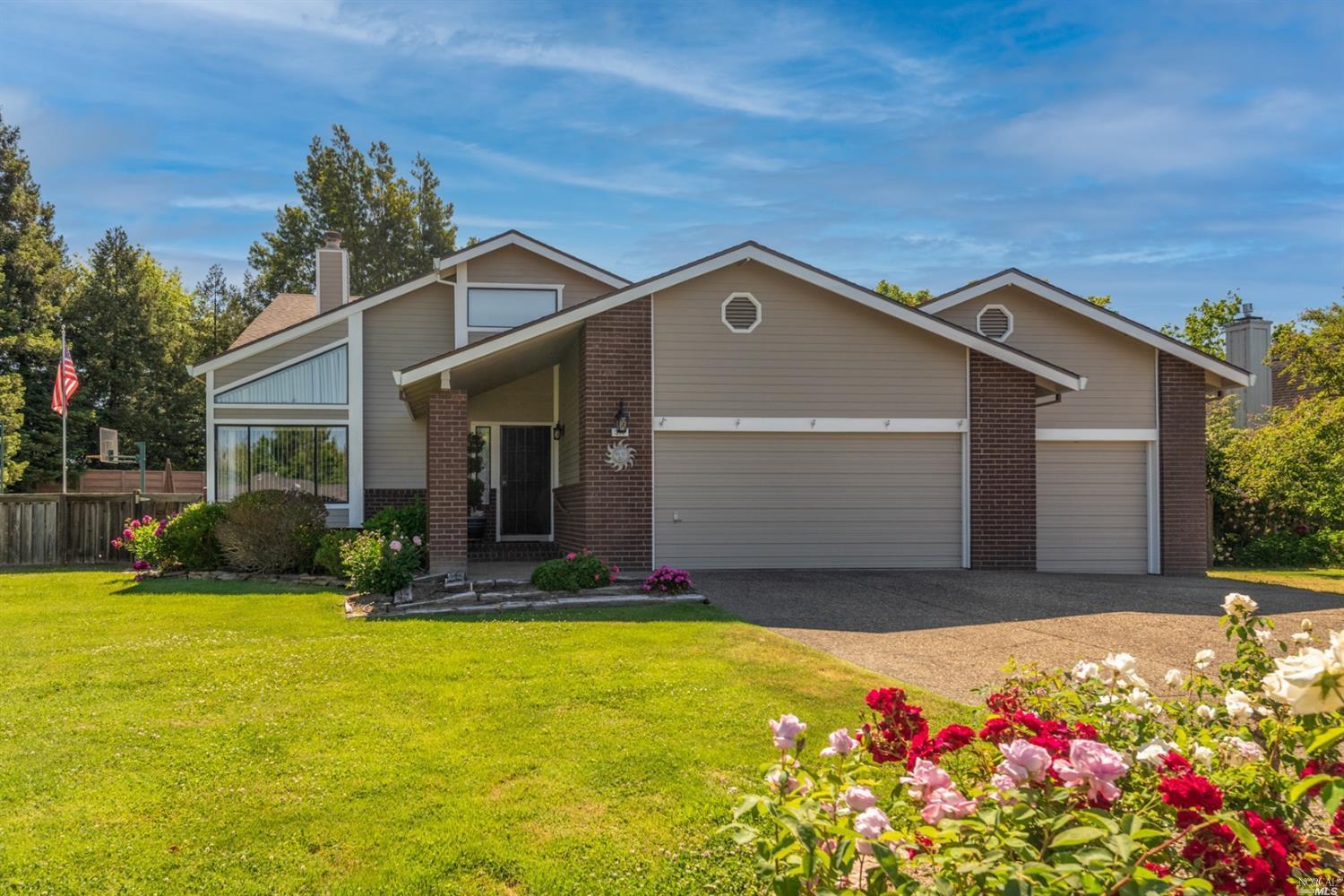 310 Equine Place Santa Rosa, CA 95401 - Photo 1 of 1 Welcome to 310 Equine Place. Just what we all want, a 3 car garage with a drive thru 3rd garage and a triple wide driveway to accommodate 6 cars.
