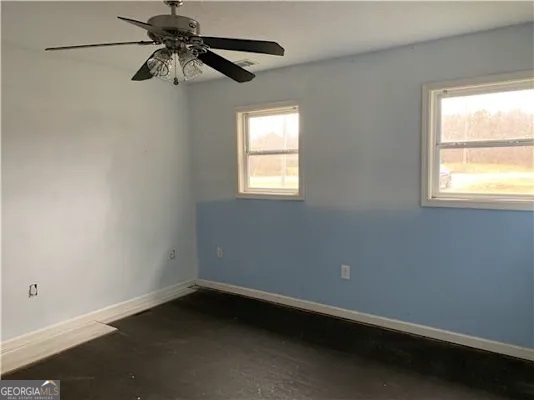 838 Racetrack Road Toccoa, GA 30577 - Photo 6 of 7 an empty room with a window