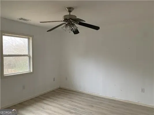 an empty room with a window