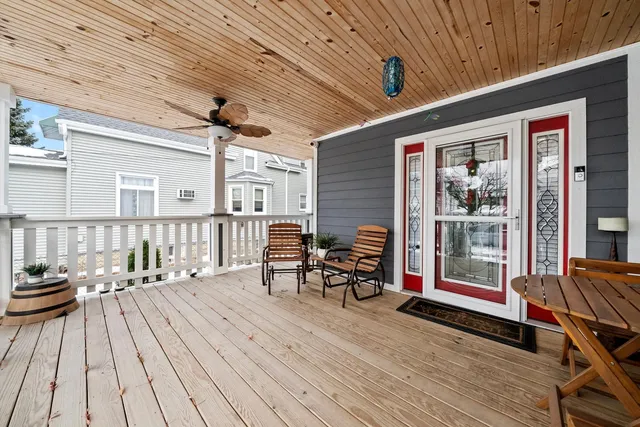 a view of a house with a yard and garage