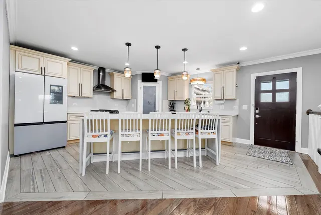 a view of a dining room with furniture and window