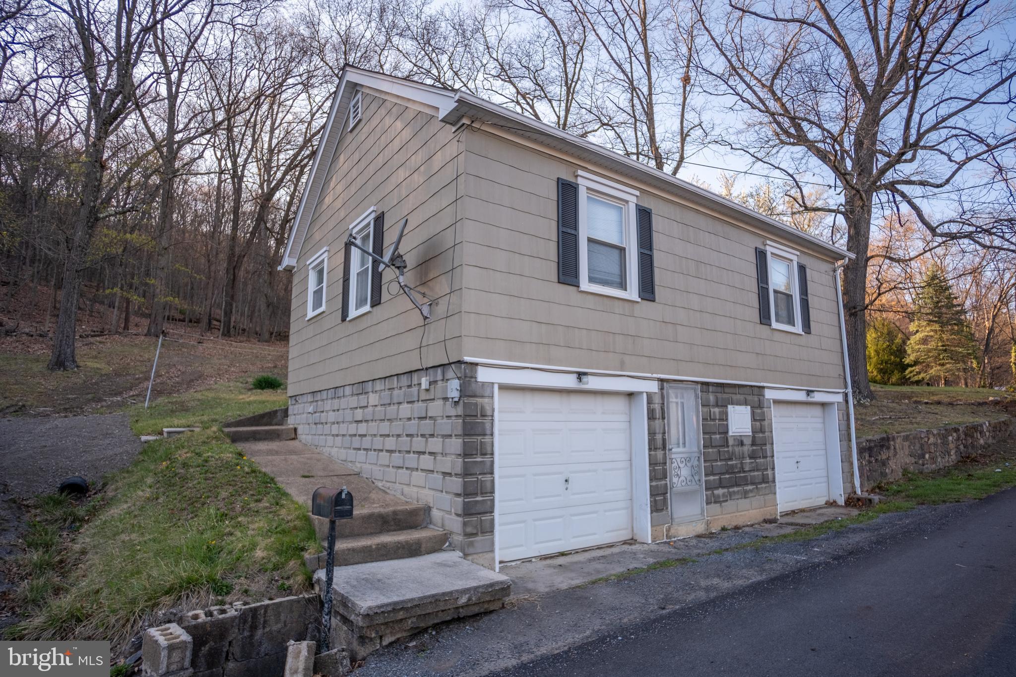 a brick house with a large windows