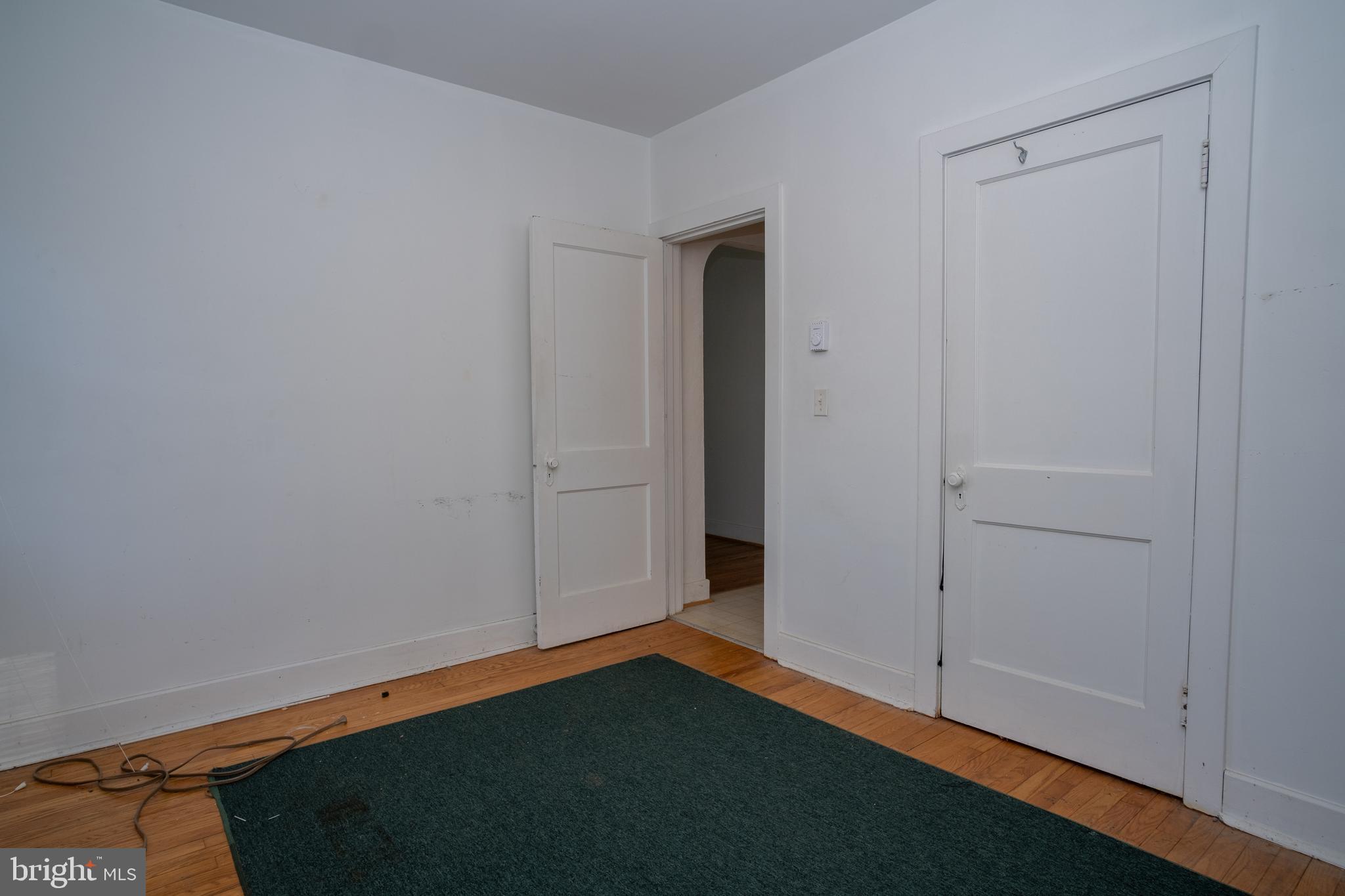 12401 Wright Avenue Cumberland, MD 21502 - Photo 15 of 17 an empty room with wooden floor