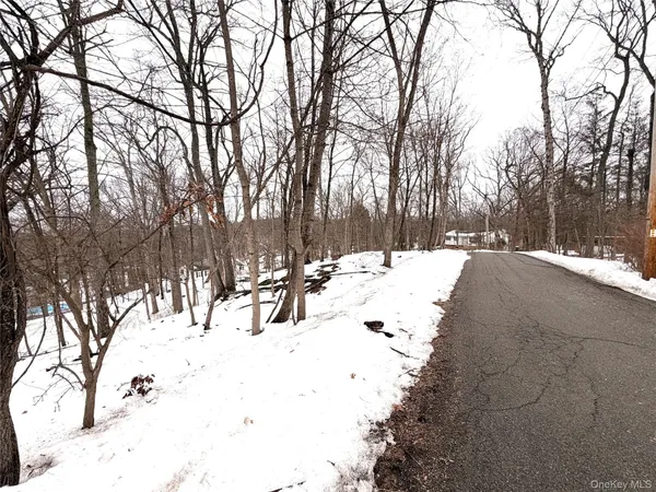 a view of snow on the road
