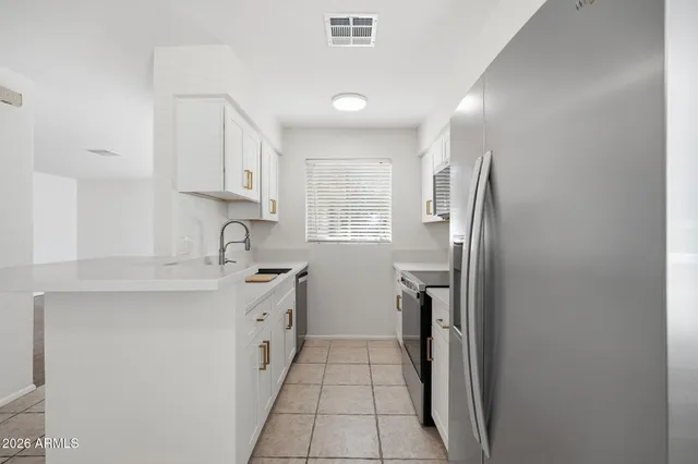 $295,000 | 97 North Cooper Road, Unit 93, Chandler, AZ 85225