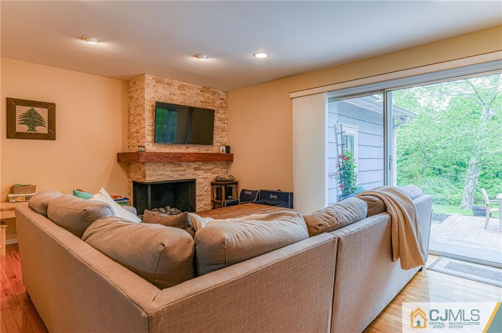 3 Spruce Lane Princeton, NJ 08540 - Photo 15 of 34 a living room with furniture and a fireplace