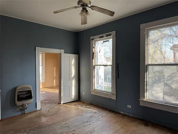 a view of livingroom with furniture window and wooden floor