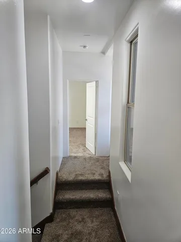 a bathroom with a glass door shower