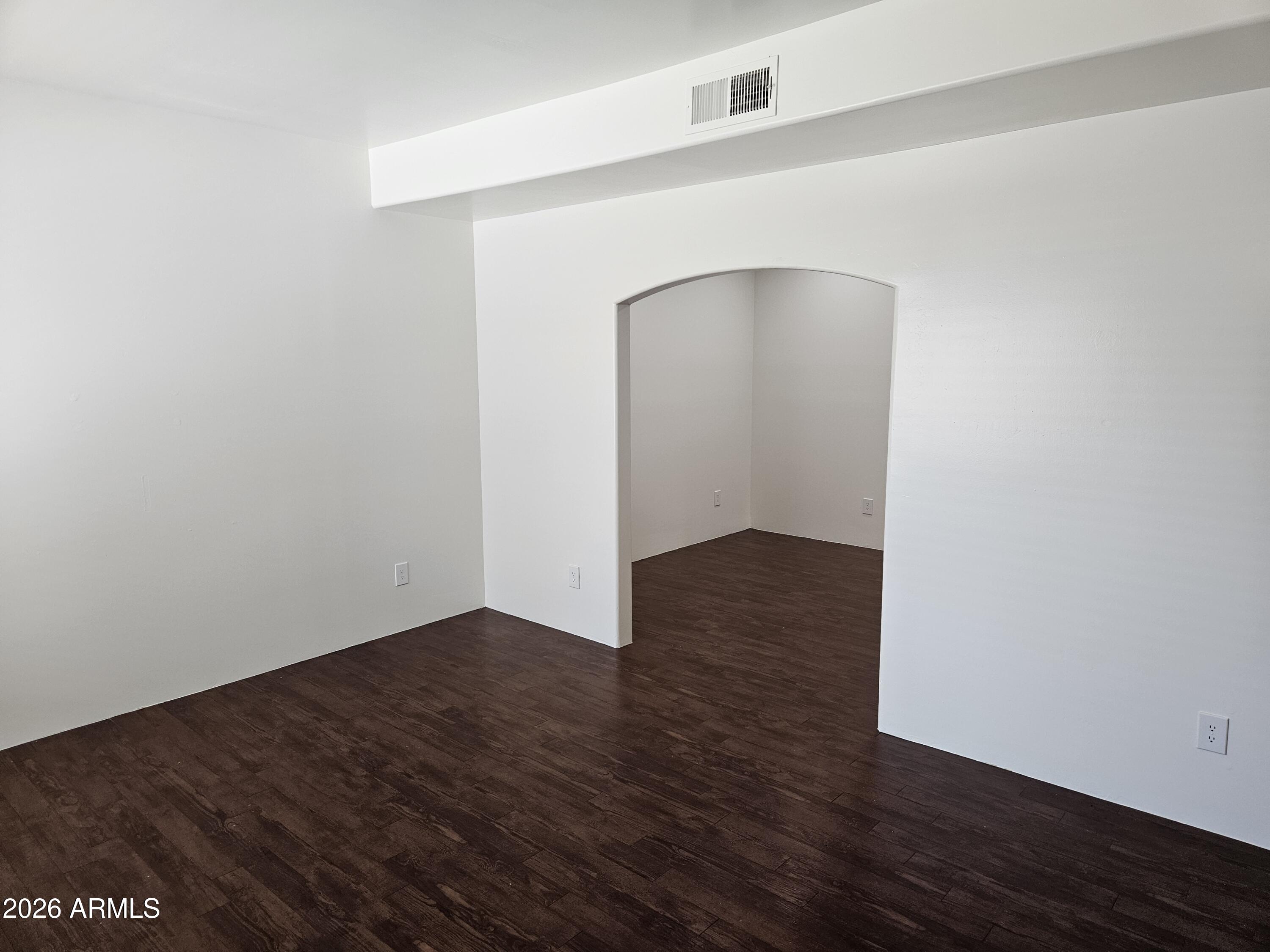 4113 North 22nd Street, Unit 5 Phoenix, AZ 85016 - Photo 2 of 60 a view of an empty room with wooden floor