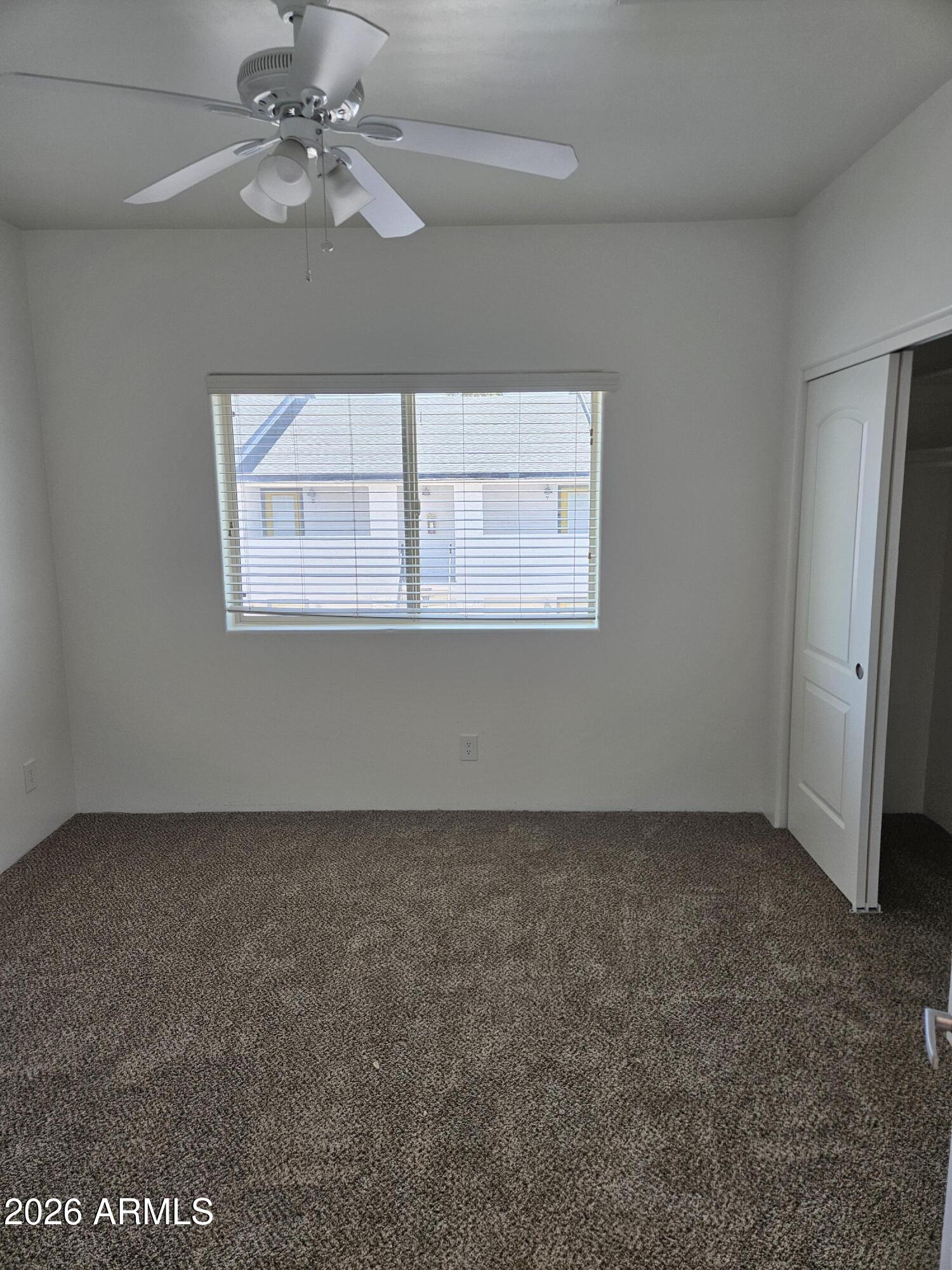 4113 North 22nd Street, Unit 5 Phoenix, AZ 85016 - Photo 25 of 60 an empty room with a window