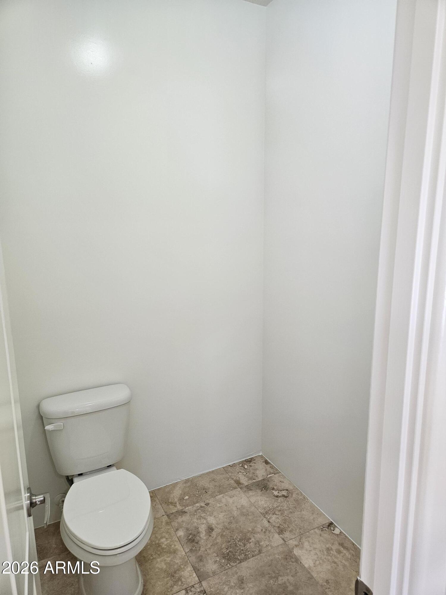4113 North 22nd Street, Unit 5 Phoenix, AZ 85016 - Photo 43 of 60 a white toilet sitting next to a shower