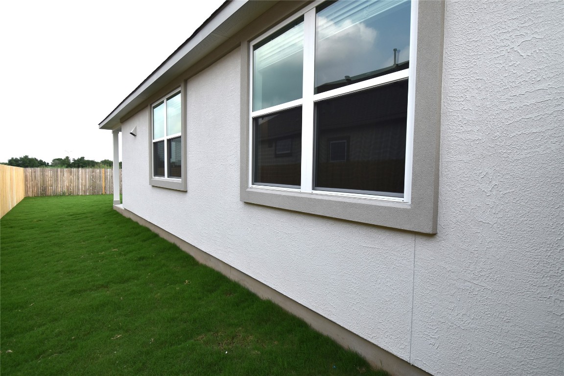 18113 Emu Lane Manor, TX 78653 - Photo 20 of 20 a view of a house with backyard and sitting area