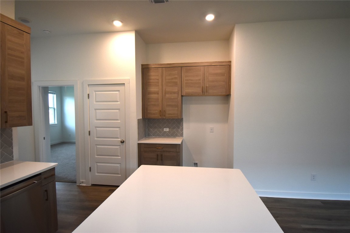 18113 Emu Lane Manor, TX 78653 - Photo 7 of 20 a bedroom with a bed and bathroom