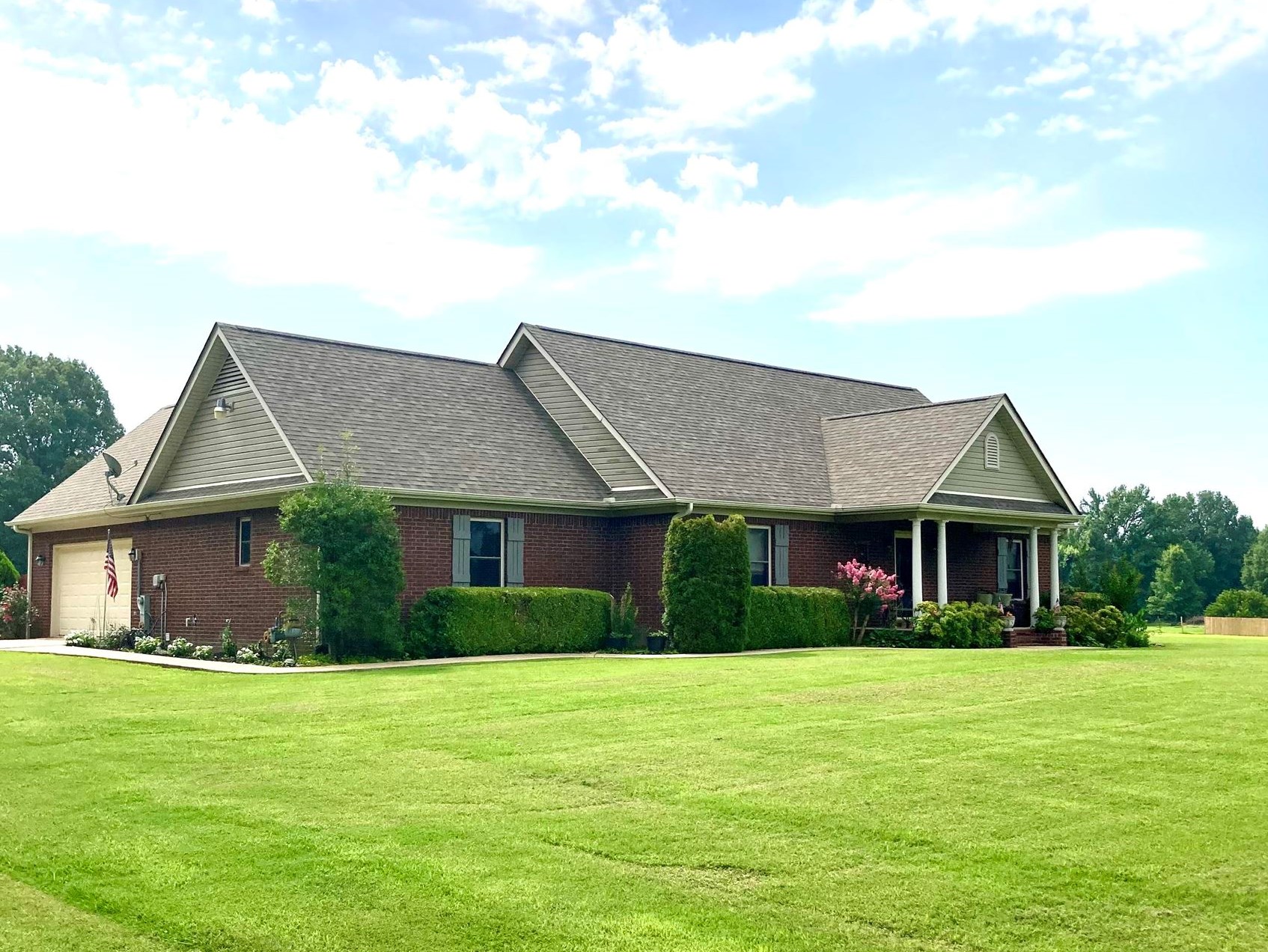 7980 Rankin Branch Road Millington, TN 38053 - Photo 1 of 28 Ranch-style house with a front lawn and a garage