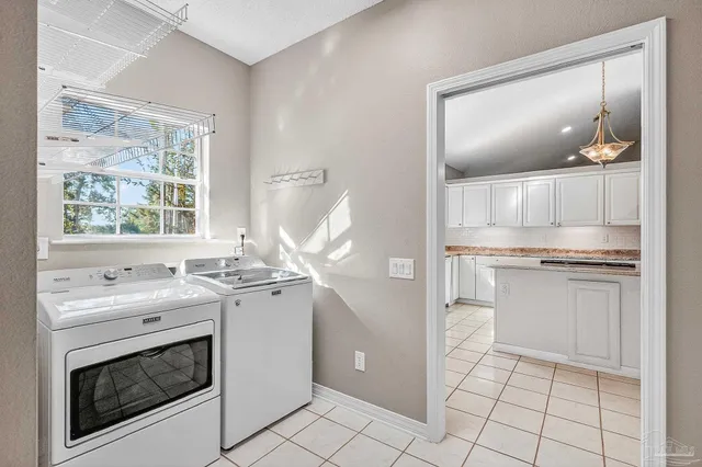 a bathroom with a sink a toilet and bathtub