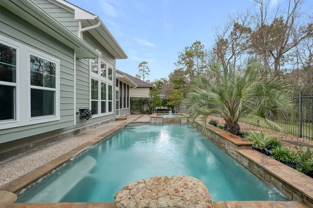 a view of a backyard with a lake view