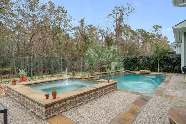 swimming pool with couple of trees