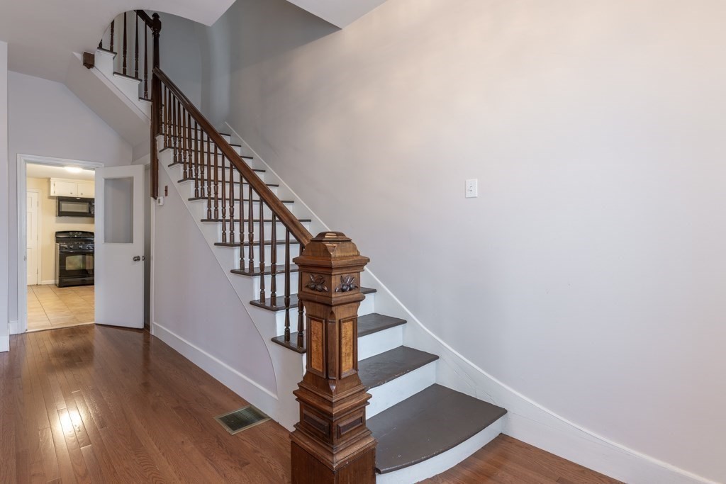 55 Morse Street, Unit 1 Watertown, MA 02472 - Photo 2 of 12 a view of entryway with wooden floor