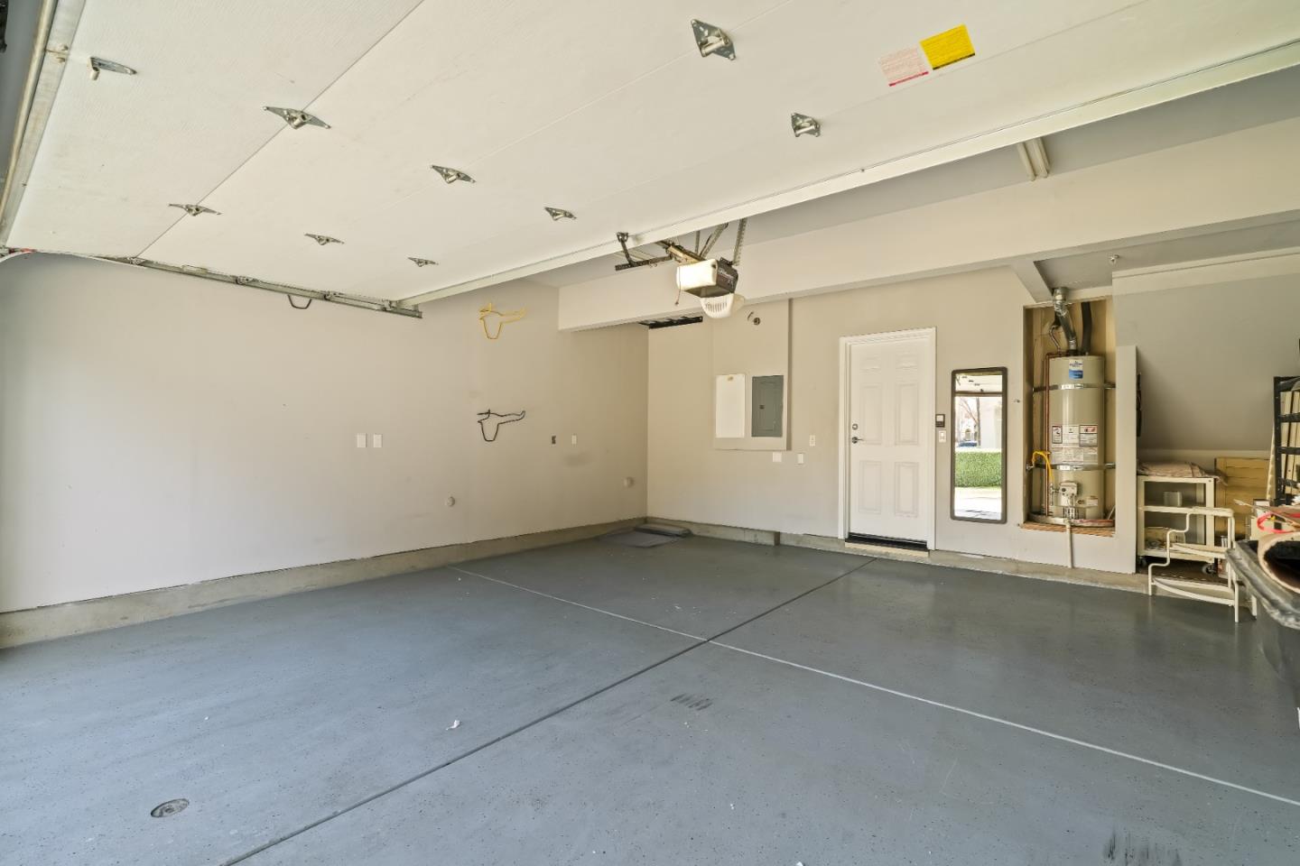 451 Chagall Street Mountain View, CA 94041 - Photo 51 of 58 an empty room with wooden floor and windows