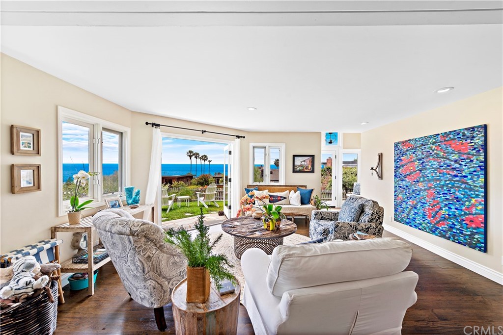 30852 Driftwood Drive Laguna Beach, CA 92651 - Photo 14 of 54 a living room with furniture and a flat screen tv