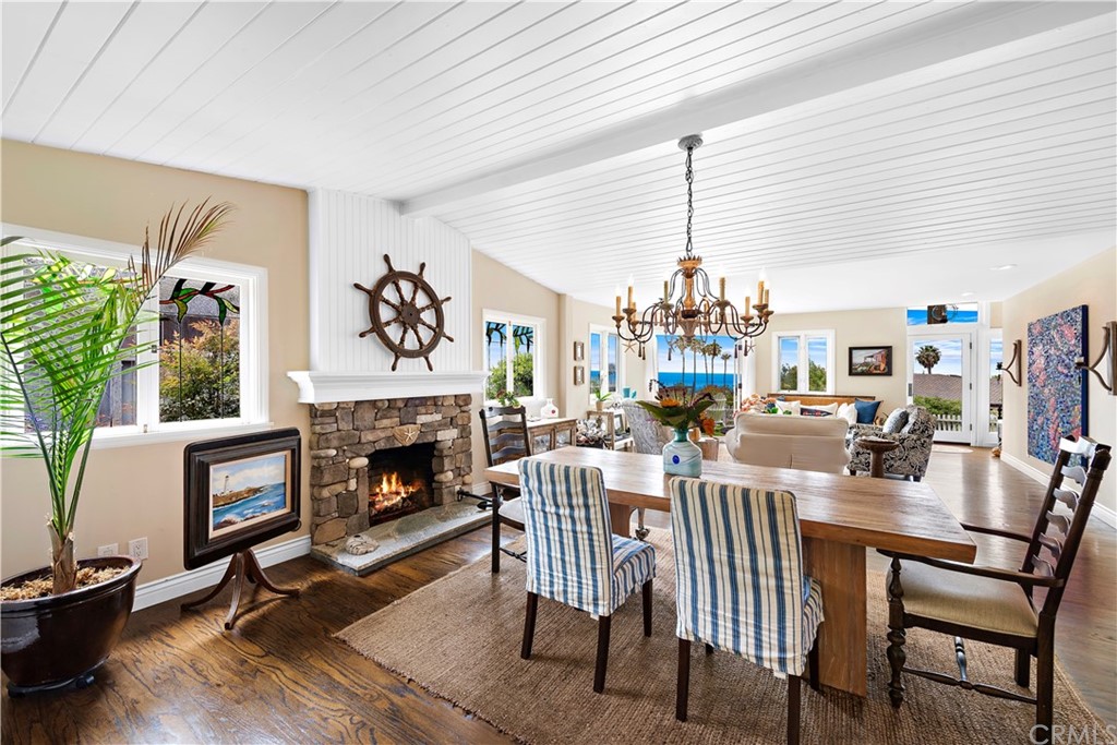 30852 Driftwood Drive Laguna Beach, CA 92651 - Photo 19 of 54 a view of a dining room with furniture window and wooden floor