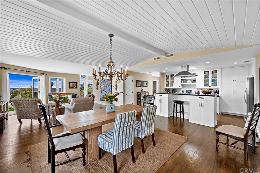 30852 Driftwood Drive Laguna Beach, CA 92651 - Photo 20 of 54 a view of a dining room with furniture and wooden floor